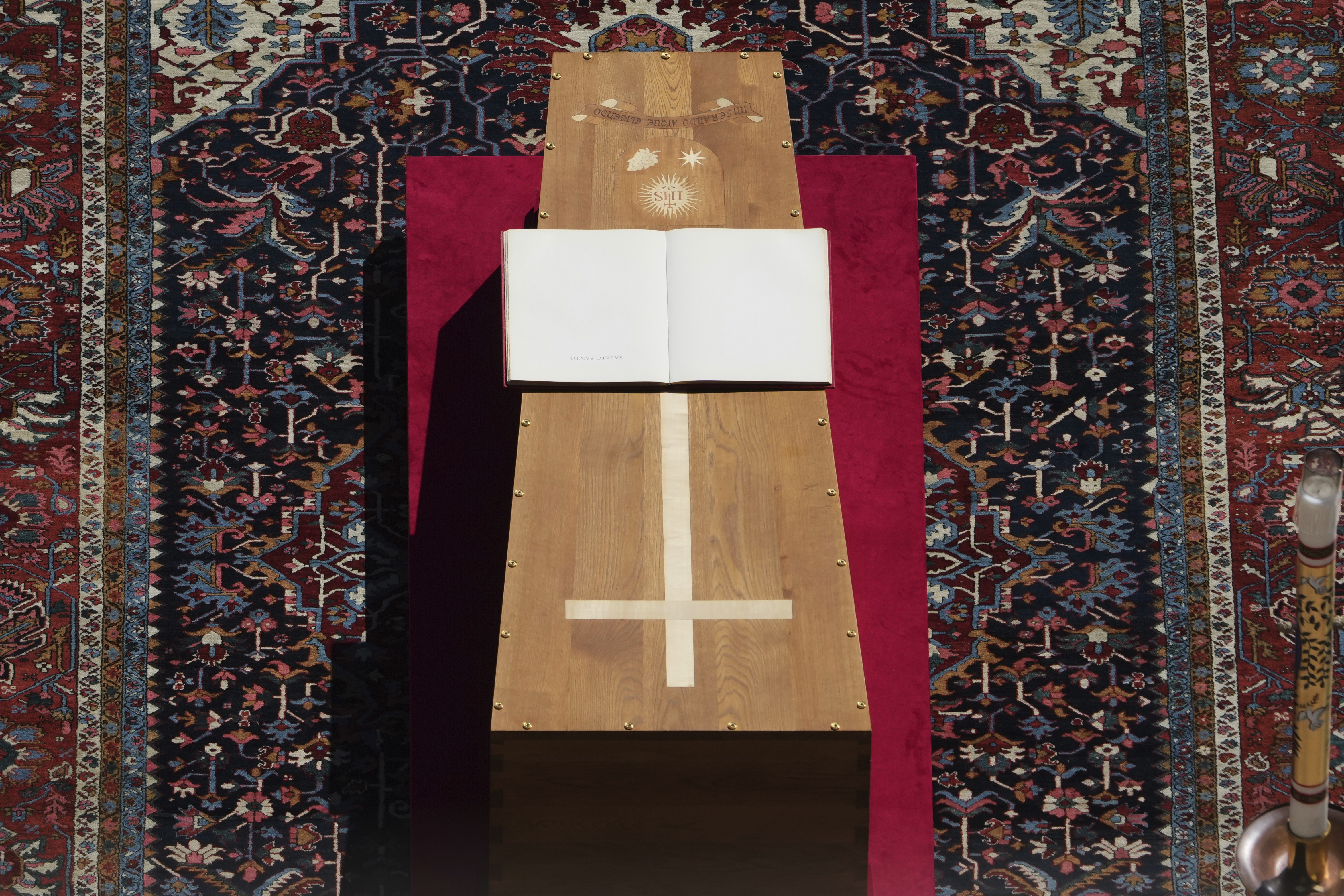 The book of the Gospels lies on the coffin of Pope Francis during his funeral ceremony in St. Peter's Square at the Vatican, Saturday, April 26, 2025. (AP Photo/Alessandra Tarantino)