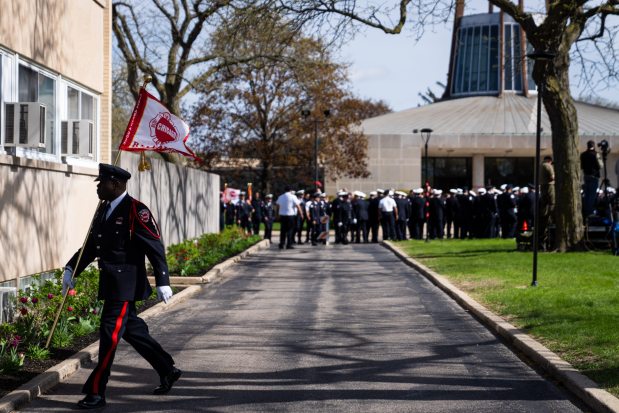 First responders and community members attend a funeral, April 29, 2025, at St. John Brebeuf Church in Niles for Capt. David Meyer, who died last week after responding to a West Side garage fire. (Audrey Richardson/Chicago Tribune)