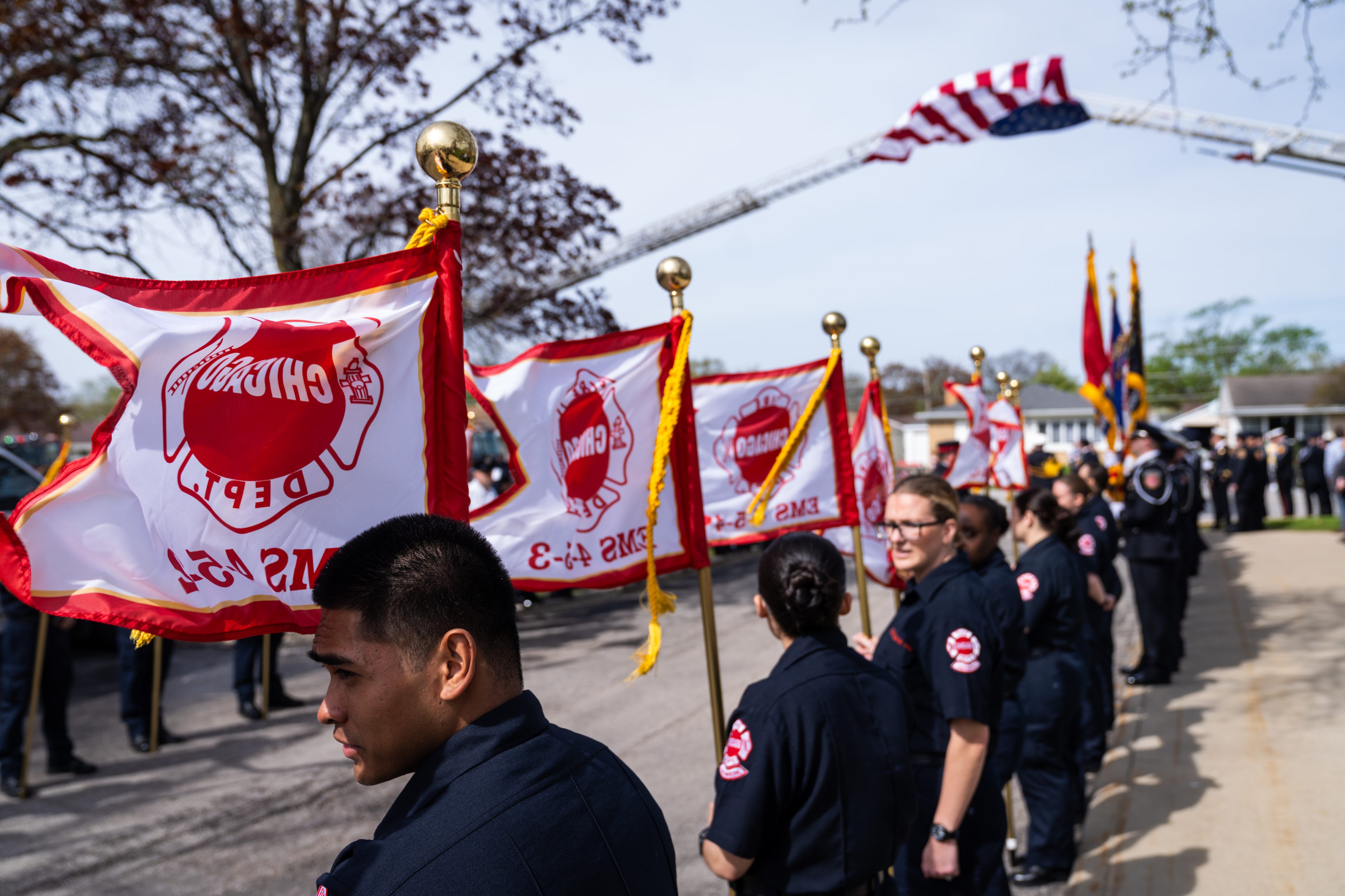 Karl Villegas, left, stands among other Chicago Fire Department candidates, while paying respects to Capt. David Meyer, April 29, 2025, at St. John Brebeuf Church in Niles. (Audrey Richardson/Chicago Tribune)