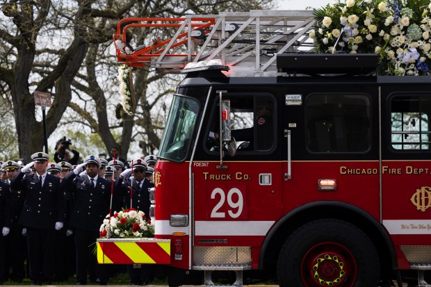 CFD Truck 29 brings in the casket of Capt. David Meyer for his funeral, April 29, 2025, at St. John Brebeuf Church in Niles. (Audrey Richardson/Chicago Tribune)