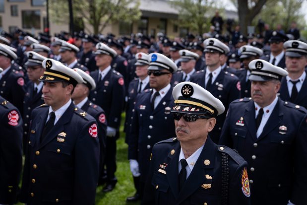 Members of the Chicago Fire Department, the Chicago Police Department, family, friends and community members attend a funeral, on April 29, 2025, at St. John Brebeuf Church in Niles for Capt. David Meyer, who died last week after responding to a West Side garage fire. (Audrey Richardson/Chicago Tribune)