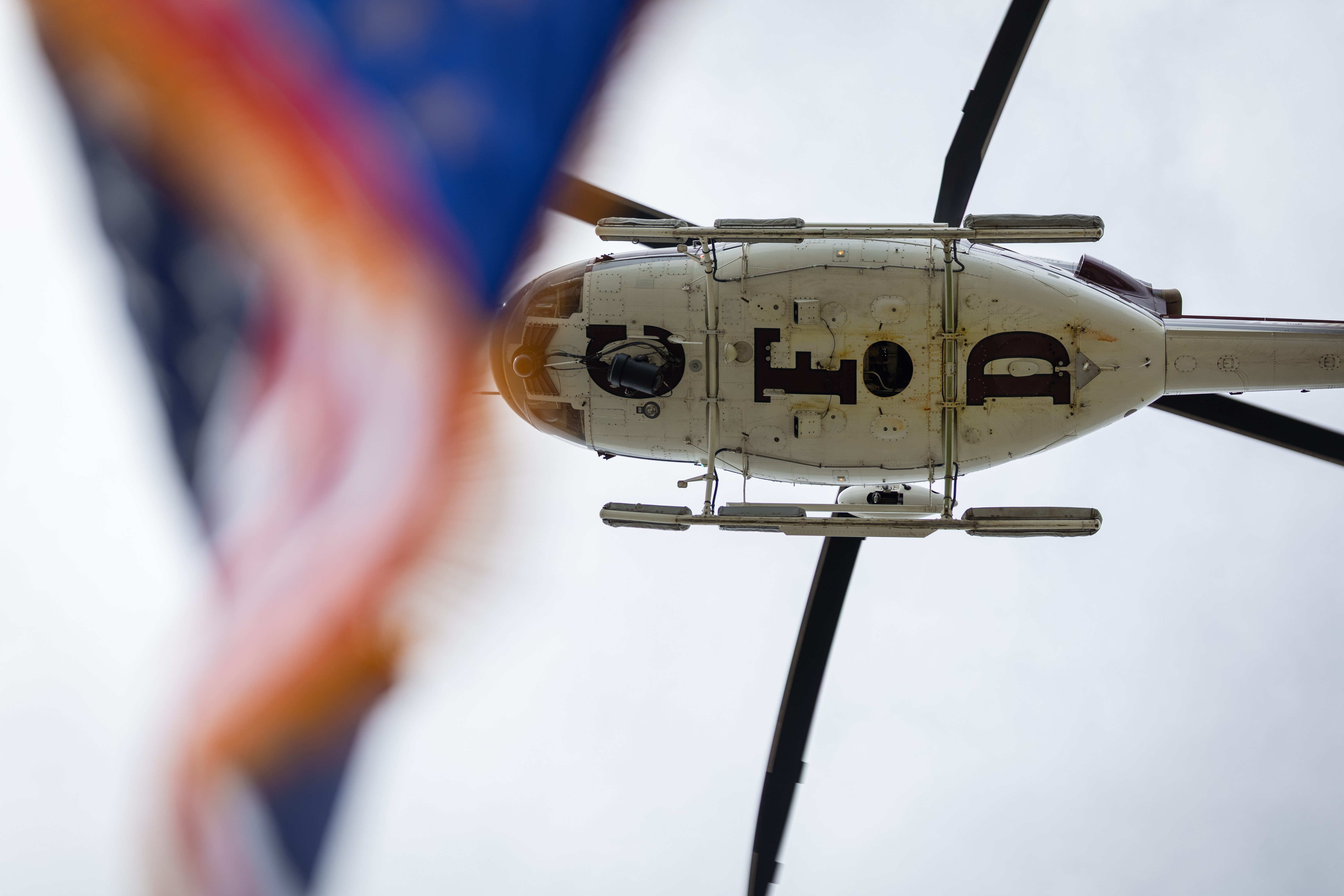 A Chicago Fire Department helicopter flies over the funeral service for Capt. David Meyer on April 29, 2025, at St. John Brebeuf Church in Niles. (Audrey Richardson/Chicago Tribune)