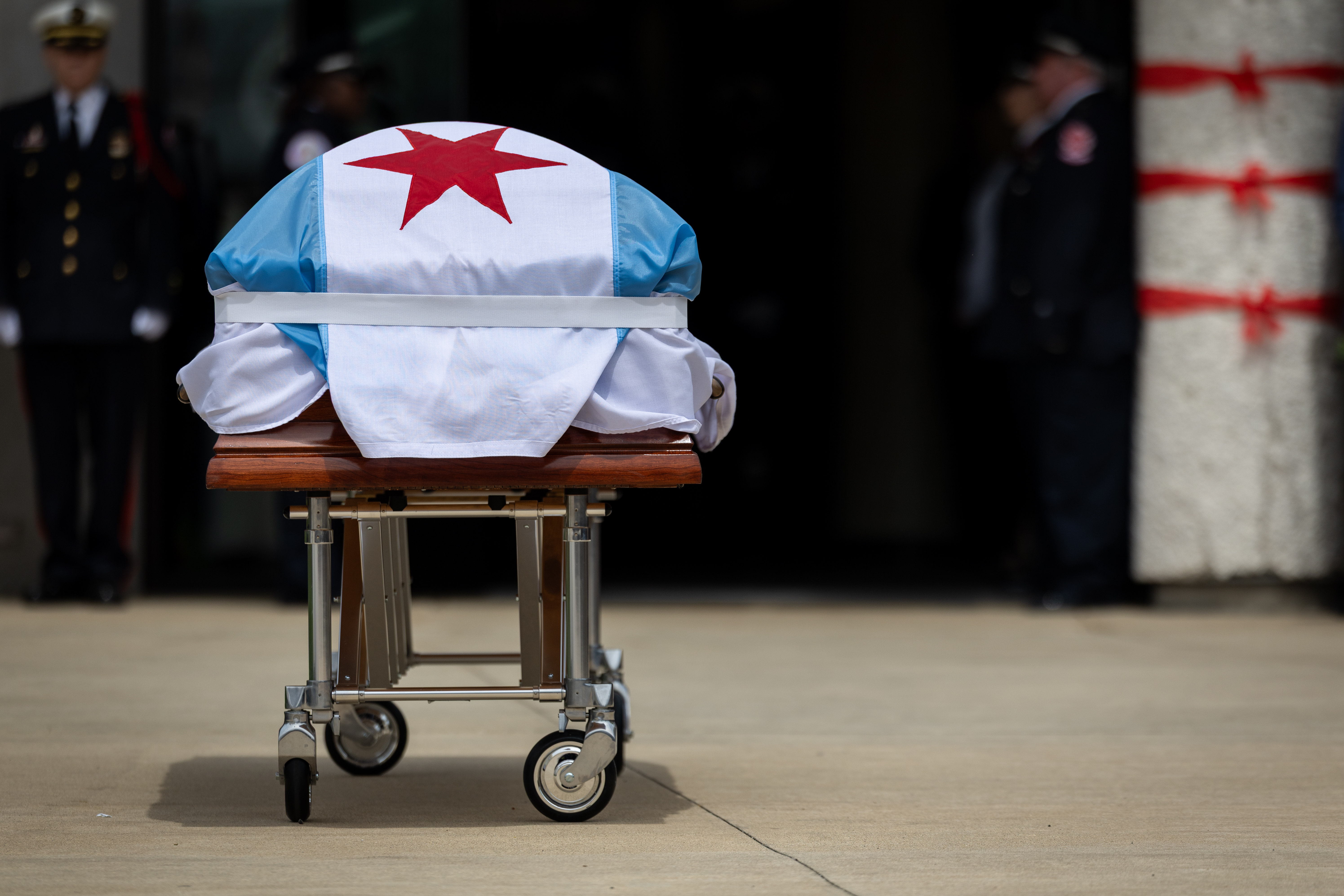 The casket of Capt. David Meyer rests before being placed in the hearse during a funeral service on April 29, 2025, at St. John Brebeuf Church in Niles. (Audrey Richardson/Chicago Tribune)