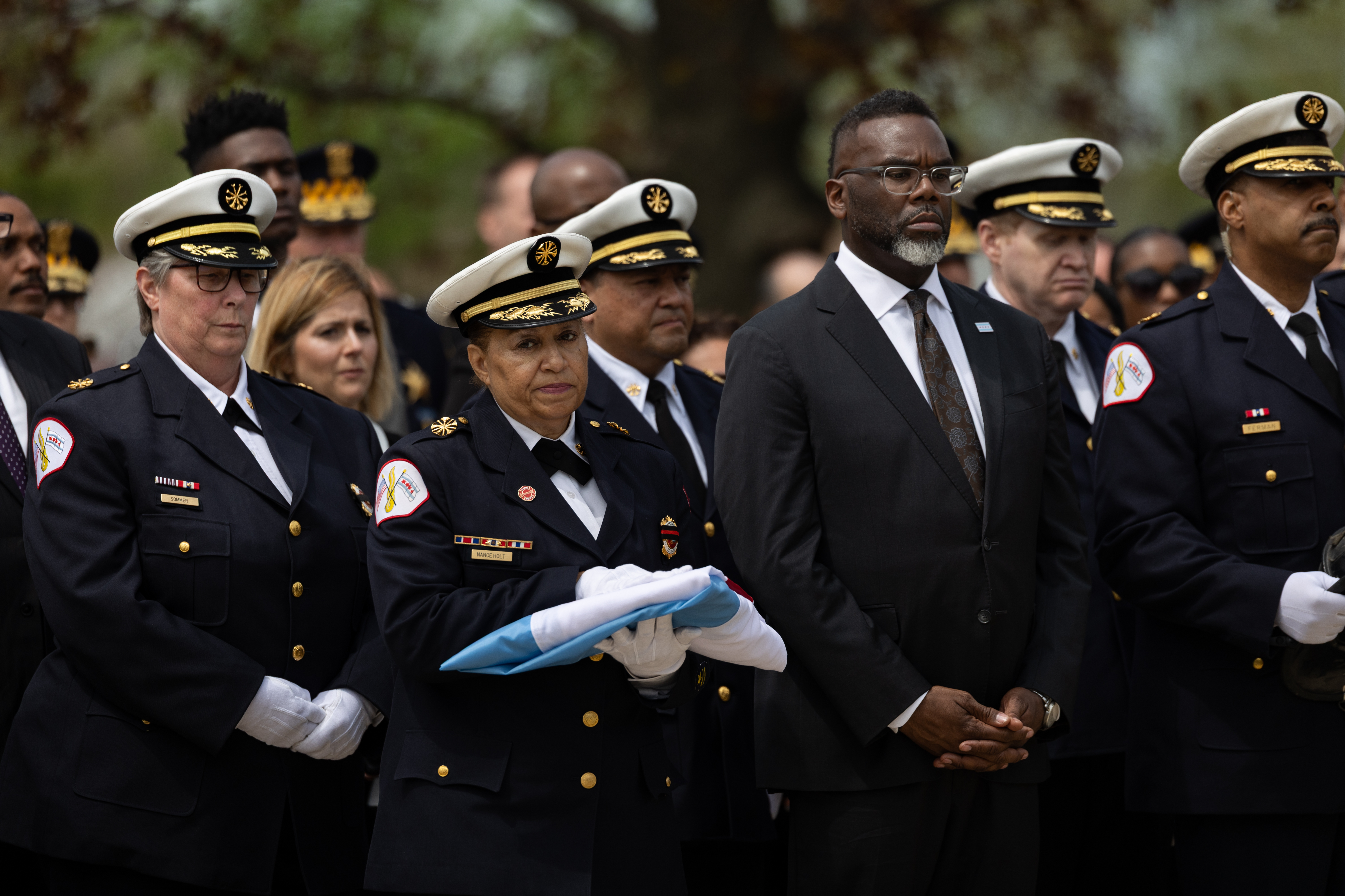 Chicago Fire Commissioner Annette Nance-Holt, left, alongside Mayor Brandon Johnson during a funeral service for Capt. David Meyer, who died last week when responding to a West Side garage fire, on April 29, 2025, at St. John Brebeuf Church in Niles. (Audrey Richardson/Chicago Tribune)