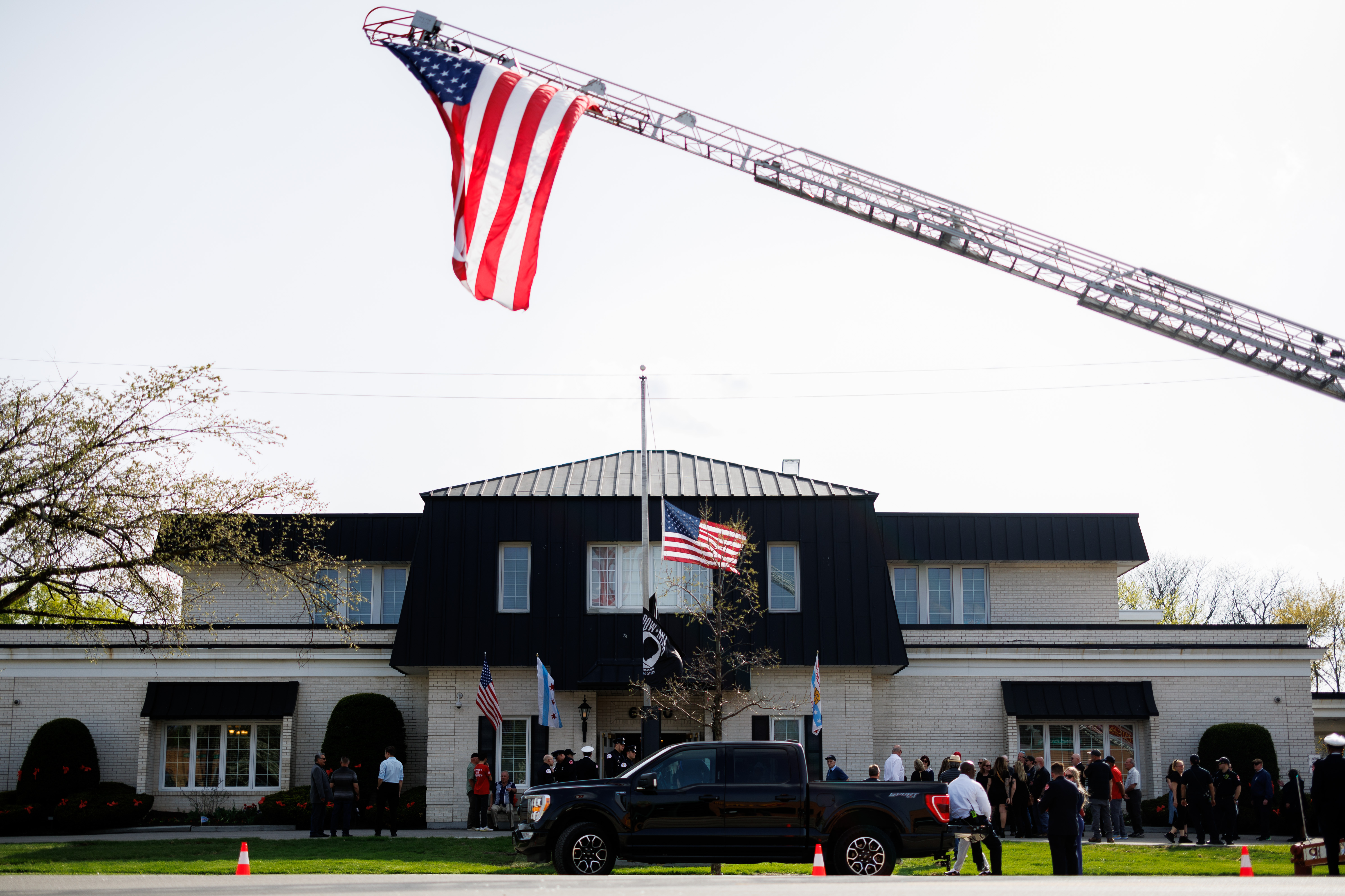 Members of the Chicago Fire Department, the Chicago Police Department, family, friends and members of the community attend a wake , on April 28, 2025, at Malec & Sons Funeral Home for Capt. David Meyer, who died last week after responding to a West Side garage fire. Meyer was fatally injured when the garage collapsed after the fire was out. (Armando L. Sanchez/Chicago Tribune)